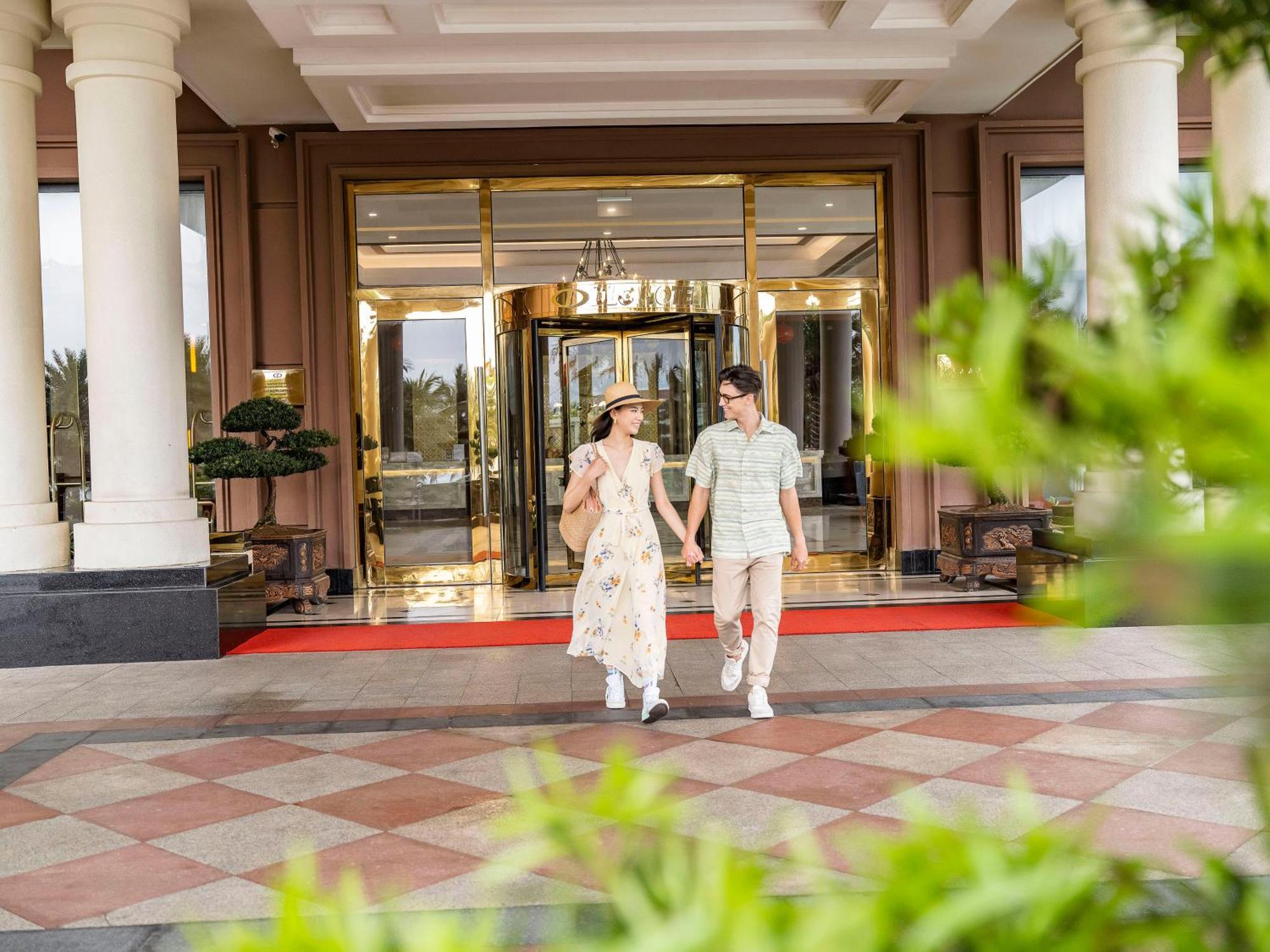 Dlg Hotel Danang Exterior foto Entrance of the hotel